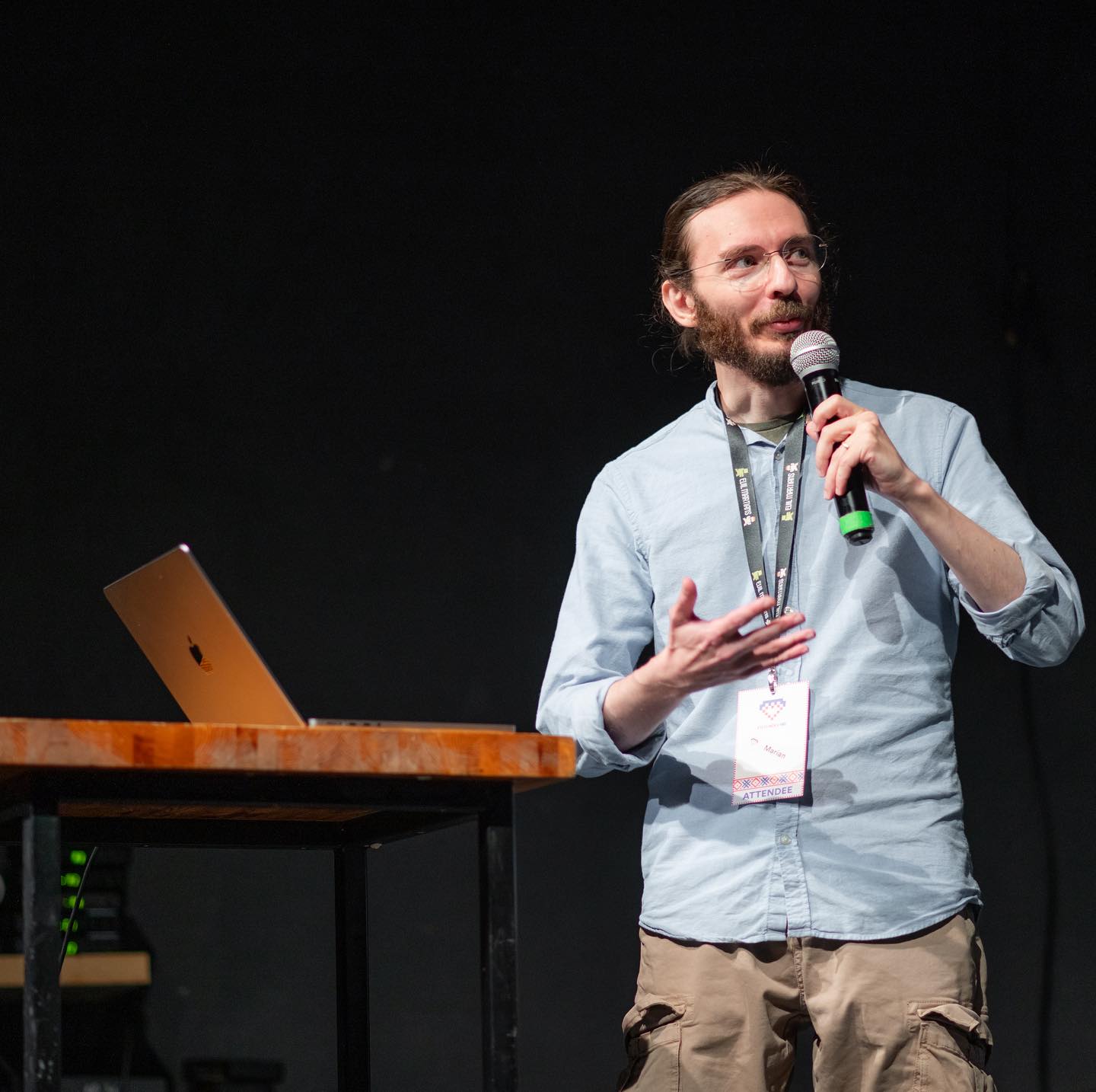 Marian Posaceanu speaking at a conference